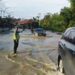 Air Sungai Merlung Meluap, Menggenangi Jalinsum KM 120,Polisi Siapkan Skema Pengalihan Arus Balik Nataru